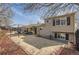 Spacious backyard featuring a stamped concrete patio perfect for entertaining with comfortable seating at 4063 S Quintero Way, Aurora, CO 80013