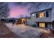 Spacious backyard with stamped concrete patio, outdoor seating, and a well-maintained lawn for entertaining at 4063 S Quintero Way, Aurora, CO 80013