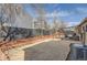 Private backyard featuring a large patio, perfect for outdoor entertaining and relaxation at 4063 S Quintero Way, Aurora, CO 80013
