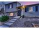 Charming home exterior with well-maintained landscaping, creating a welcoming curb appeal at 4063 S Quintero Way, Aurora, CO 80013