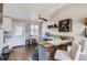 Charming breakfast nook with a bar area, seating, and a view to the backyard at 4063 S Quintero Way, Aurora, CO 80013
