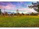 This community park offers a playground and open green space, creating a fun environment at 4063 S Quintero Way, Aurora, CO 80013