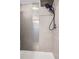 Custom shower stall with sleek tilework and upgraded shower head at 4063 S Quintero Way, Aurora, CO 80013