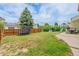 Spacious fenced back yard with play equipment at 16051 E Alabama Dr, Aurora, CO 80017