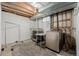 An unfinished basement laundry room with white walls and a washer and dryer at 16051 E Alabama Dr, Aurora, CO 80017