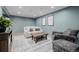 Cozy living room with a sofa, accent chair, and an area rug at 16051 E Alabama Dr, Aurora, CO 80017