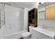 Bathroom with a combination tub and shower and built-in storage at 30273 Conifer Rd, Evergreen, CO 80439