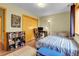 Bedroom with hardwood floors, area rug, and good natural light at 30273 Conifer Rd, Evergreen, CO 80439