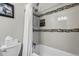 Tiled shower area with a niche for toiletries and a large bathtub at 2399 E 99Th Way, Thornton, CO 80229