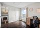 This bedroom has a large window, hardwood floors, and fresh paint at 2399 E 99Th Way, Thornton, CO 80229