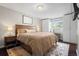 Cozy bedroom with carpet, natural light, a closet, and modern decor at 2399 E 99Th Way, Thornton, CO 80229