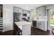 Modern kitchen with stainless steel appliances and island at 2399 E 99Th Way, Thornton, CO 80229