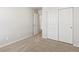 The bedroom features neutral carpet, white walls and a closet at 6531 N Malaya St, Aurora, CO 80019