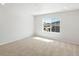 Bright bedroom with natural light and plush carpeting at 6531 N Malaya St, Aurora, CO 80019