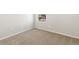 The bedroom features neutral carpet, white walls and window at 6531 N Malaya St, Aurora, CO 80019