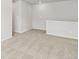 Spacious loft with neutral walls and carpeted floors at 6531 N Malaya St, Aurora, CO 80019