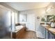 Elegant bathroom with double vanity, soaking tub, and shower at 10587 Parkington Ln # B, Highlands Ranch, CO 80126