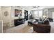 Cozy living room featuring a fireplace and comfortable seating at 10587 Parkington Ln # B, Highlands Ranch, CO 80126