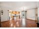 Bright dining area featuring hardwood floors, chandelier lighting, and sliding glass doors to the backyard at 8552 Gray Ct, Arvada, CO 80003
