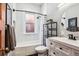 Cozy bathroom with a shower-tub combo, decorative shower curtain, and modern vanity at 1401 N Franklin St # 1, Denver, CO 80218
