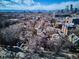 Scenic cityscape with a clear blue sky, distant mountains, and diverse architecture, from low to high rise at 1401 N Franklin St # 1, Denver, CO 80218