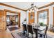 Bright dining room with hardwood flooring, natural light, and easy access to living room at 1401 N Franklin St # 1, Denver, CO 80218