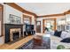 Cozy living room with a fireplace, hardwood floors, and traditional design at 1401 N Franklin St # 1, Denver, CO 80218