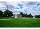 Picturesque park featuring a colonnade structure and fountains with a backdrop of lush green grass at 1401 N Franklin St # 1, Denver, CO 80218