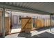 Townhome featuring a covered carport, offering protection and convenience for parking needs at 2642 Devonshire Ct, Denver, CO 80229