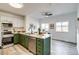 Modern kitchen with stainless steel appliances and an open floor plan at 2642 Devonshire Ct, Denver, CO 80229