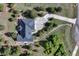 Aerial view of the home highlighting its layout, driveway, and surrounding greenery at 18376 Heavens Pl, Monument, CO 80132