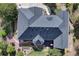 Birds-eye view of home showing roof detail, patio, and yard at 18376 Heavens Pl, Monument, CO 80132