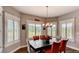 Inviting dining area with large windows offering lots of natural light and backyard views at 18376 Heavens Pl, Monument, CO 80132