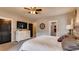 Spacious main bedroom features plush carpet, ample natural light, and neutral decor at 18376 Heavens Pl, Monument, CO 80132