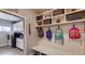 Convenient mud room with built-in storage, perfect for organization and backpacks at 18376 Heavens Pl, Monument, CO 80132