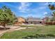 Aerial view of the backyard showing the patio, yard, and fence at 971 Parsons Ave, Castle Rock, CO 80104