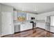 Modern kitchen featuring stainless steel appliances, white cabinetry, and a bright, clean design at 971 Parsons Ave, Castle Rock, CO 80104