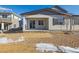 New construction home with backyard patio and gravel landscaping at 6585 N Nepal St, Aurora, CO 80019