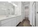 Modern bathroom with double vanity and walk-in shower at 6585 N Nepal St, Aurora, CO 80019