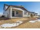 New construction home exterior showcasing a patio and landscaping at 6585 N Nepal St, Aurora, CO 80019