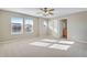 Bright bedroom with neutral decor and carpet at 13676 Cherry Way, Thornton, CO 80602