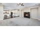 Living room features a fireplace and open floor plan at 13676 Cherry Way, Thornton, CO 80602