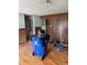 Living room with hardwood floors and adjacent rooms at 8250 Ralph Ln, Denver, CO 80221