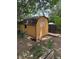 Wood shed with an American flag painted on its side at 8250 Ralph Ln, Denver, CO 80221