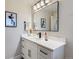 Vanity with white cabinets and quartz countertop at 3031 S Golden Way, Denver, CO 80227