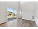 Living room with sliding glass doors leading to backyard at 1749 Marlowe E Cir, Erie, CO 80516