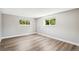 Unfurnished bedroom offering hardwood flooring, neutral walls, and natural light at 1354 S Wright St, Lakewood, CO 80228