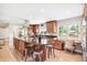 Spacious kitchen featuring a large island with seating, modern appliances, and plenty of counter space at 1354 S Wright St, Lakewood, CO 80228
