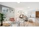 Basement features a game table, a seating area, and ample room for entertainment at 1354 S Wright St, Lakewood, CO 80228