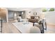 Spacious living room with plush seating, modern decor, and ample natural light at 1354 S Wright St, Lakewood, CO 80228